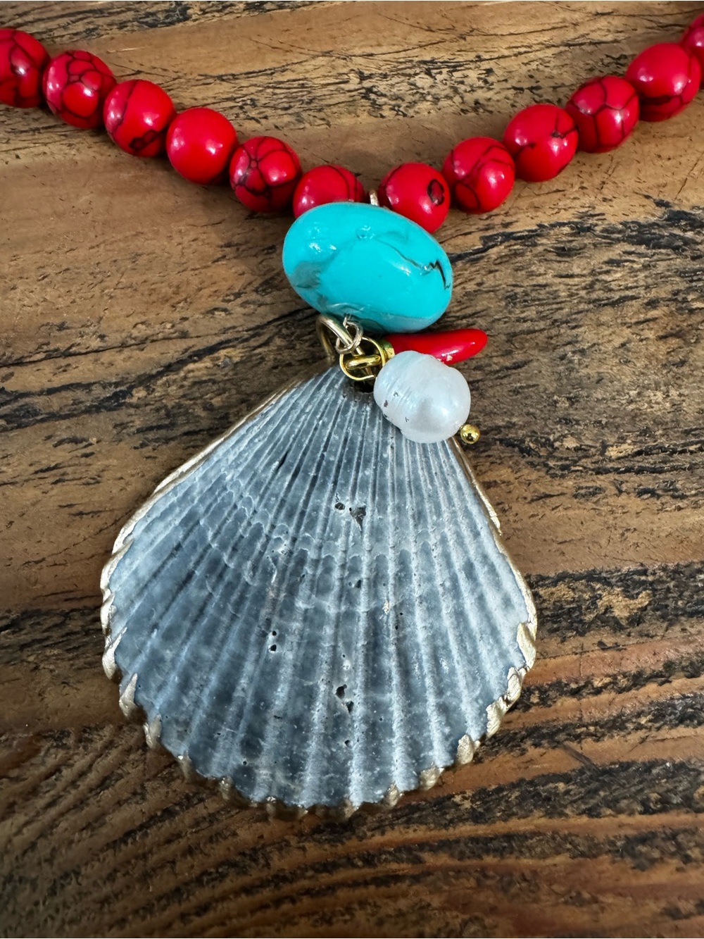 Handcrafted Red Beaded Necklace with Blue Shell Pendant